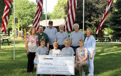 Geneseo Communications Employees Raise Over $3,000 for the Aisle of Flags